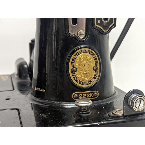 56 - A rare Singer Featherweight sewing machine 222K. Serial number EJ618431, allocated 31 March 1954.