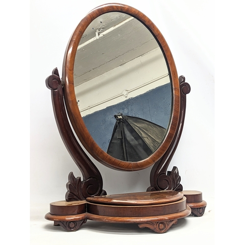 58A - A Victorian mahogany dressing mirror. 59x79cm