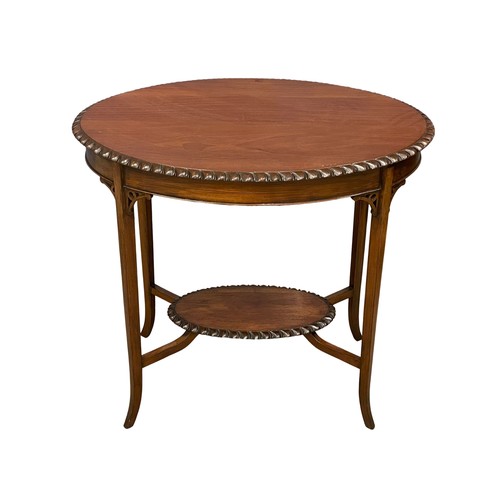 122S - An Edwardian mahogany window table. 77x51x71