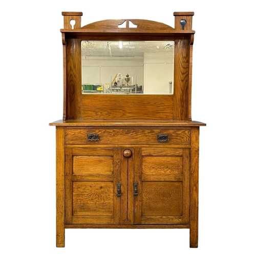 1111 - A late 19th century Arts & Crafts oak mirror back sideboard. Circa 1890. 122x51x194cm