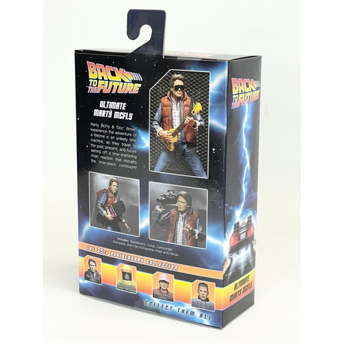 14 - A Neca Back to the Future Part II Ultimate Marty McFly action figure in box. 24cm