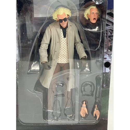 15 - A Neca Back to the Future Ultimate ‘Doc’ Brown action figure in box. 24cm