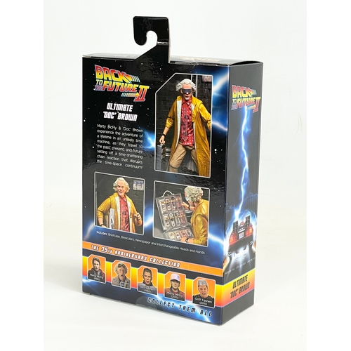 16 - A Neca Back to the Future Part II Ultimate ‘Doc’ Brown action figure in box. 24cm