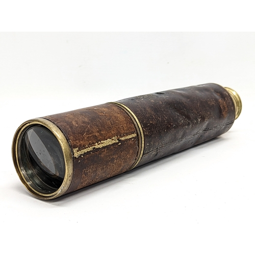 132 - A Victorian leather bound 5 draw telescope by Dollond London. Fully extended 108.5cm