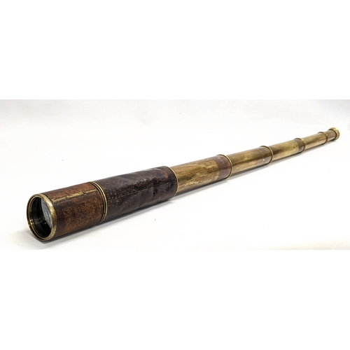 132 - A Victorian leather bound 5 draw telescope by Dollond London. Fully extended 108.5cm