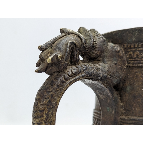 133 - An ornate 19th century Burmese bronze noodle/rice maker. 14.5cm