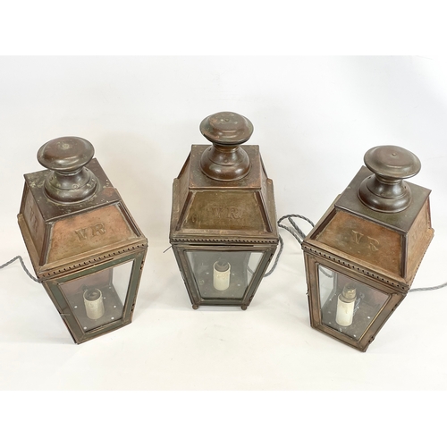 135 - A set of 3 vintage copper electric lanterns. 21x16x42cm