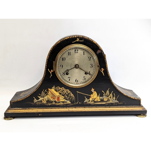 136 - A large Victorian chinoiserie mantle clock with pendulum.  50.5x29cm