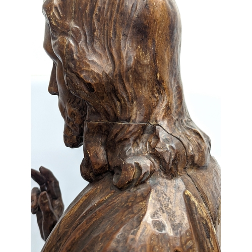 140 - A large 19th century carved limewood figure of Jesus Christ, with polychrome finish. 110cm