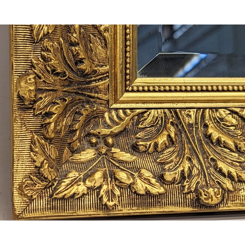 161 - A bevelled gilt framed mirror. 86.5x63.5cm