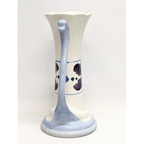 421 - A vintage Edward Radford pottery vase. 24.5cm