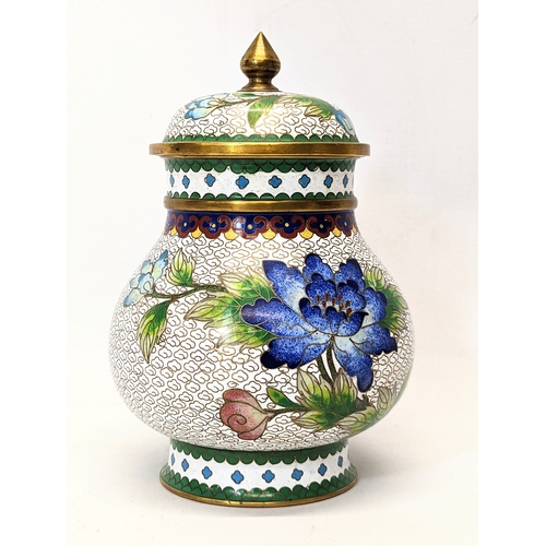 426 - A 19th century Cloisonné jar with lid. 20cm