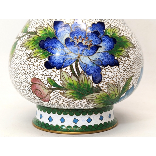 426 - A 19th century Cloisonné jar with lid. 20cm