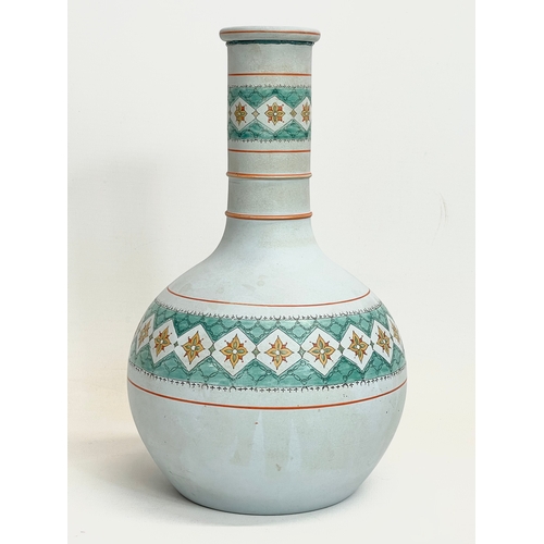 431 - A late 19th century terracotta gourd attributed to Christopher Dresser. 25.5cm