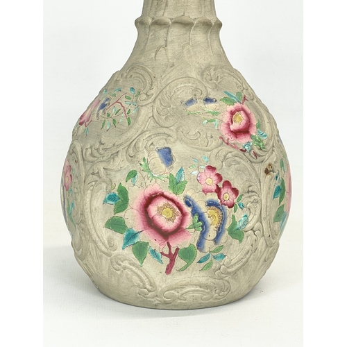 433 - A late 19th century pottery gourd. 21.5cm