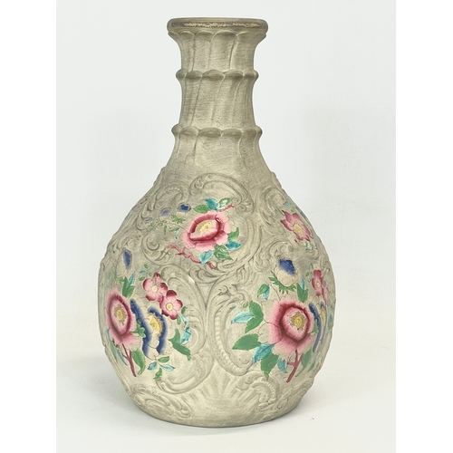 433 - A late 19th century pottery gourd. 21.5cm