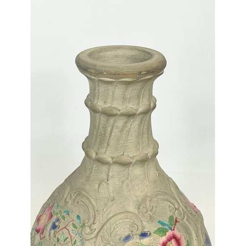 433 - A late 19th century pottery gourd. 21.5cm