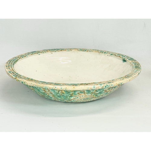 436 - A large late 19th century Majolica bowl. 36x8cm