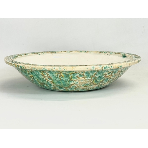 436 - A large late 19th century Majolica bowl. 36x8cm