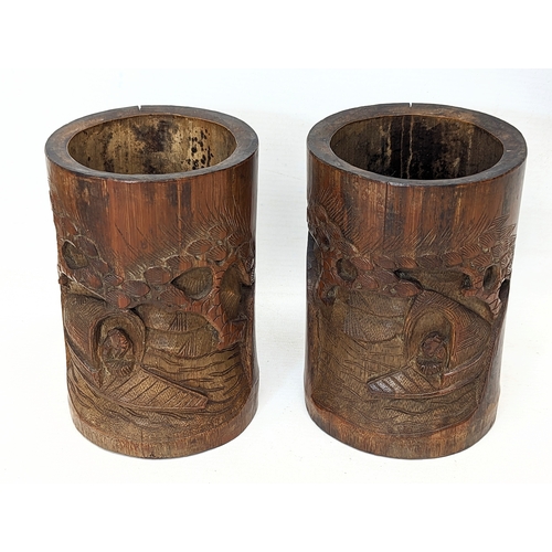 437 - A pair of late 19th century Chinese brush pots. 11.5x16.5cm