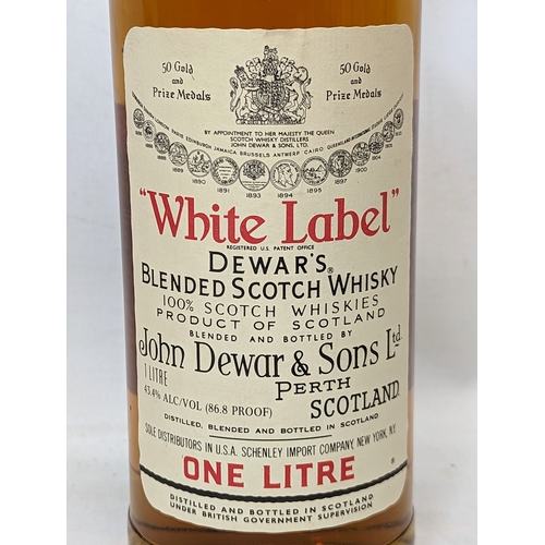 177 - An unopened bottle of Dewar's Blended Scotch Whisky 'White Label.