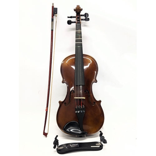 218 - A vintage violin with bow and a Wolf Forte-Primo by Willy Wolf.