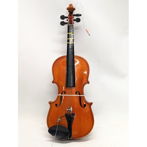 219 - A vintage Skylark miniature violin in original case, made in The People's Republic of China. 43cm