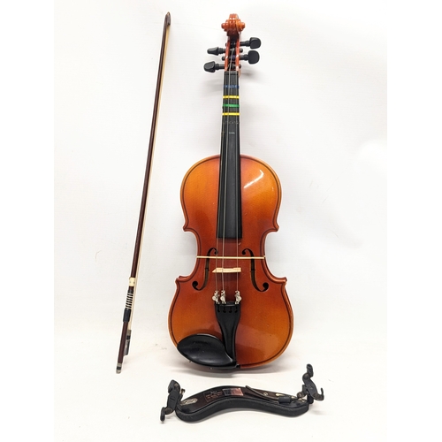 220 - A vintage Japanese Suzuki violin and Chinese bow, with Wolf Forte-Secondo by Willy Wolf shoulder res... 