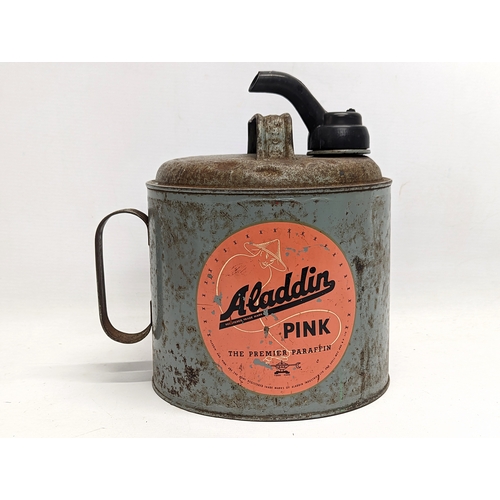 388 - A vintage Aladdin Pink oil can. 24x25cm