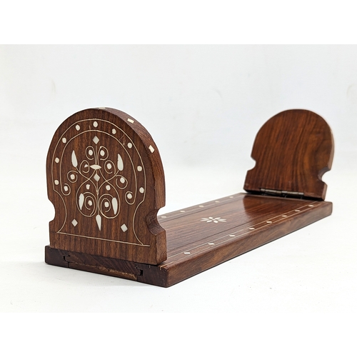 228 - An Indian rosewood extendable book stand. 35cm not extended.