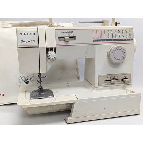 289A - A vintage Singer Tempo 60 sewing machine with case.