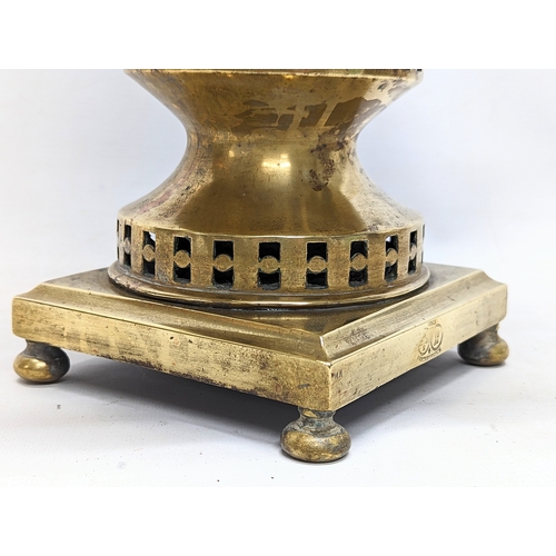 265 - A late 19th / early 20th century ornate brass samovar, stamped. 45cm