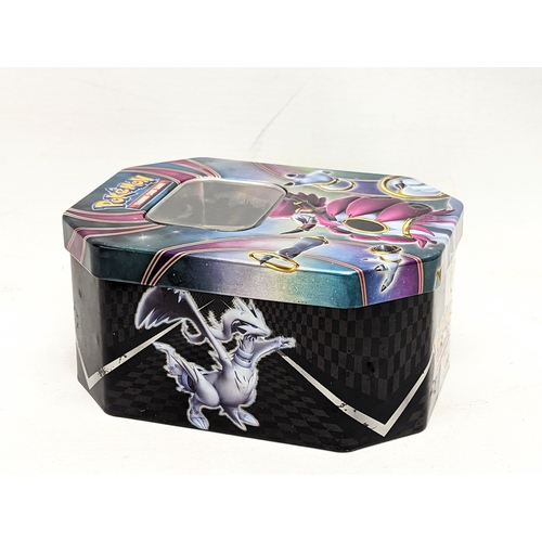 332 - A collection of Pokémon and Yu-Gi-Oh! game cards, in Pokémon tin.