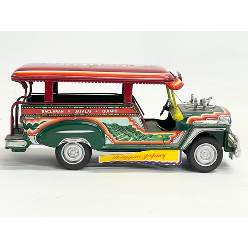 75 - A vintage tin plate Promite Philippine Jeepney jeep. 21cm