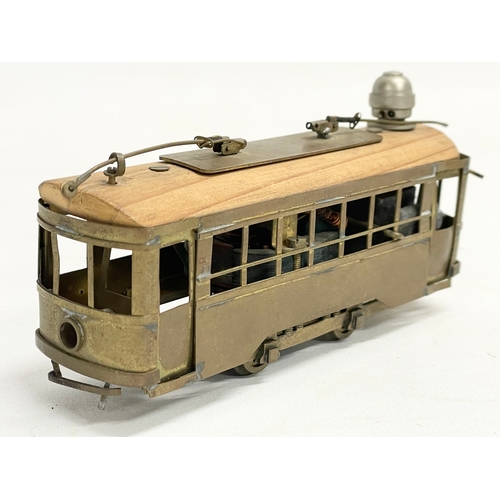 102 - A vintage brass mechanical model tram