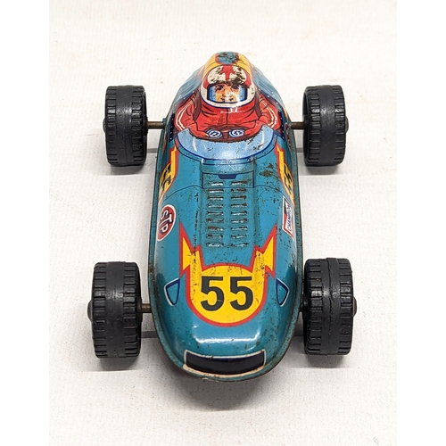 109 - A vintage tin toy car, made in Japan. Circa 1950s
 14.5cm