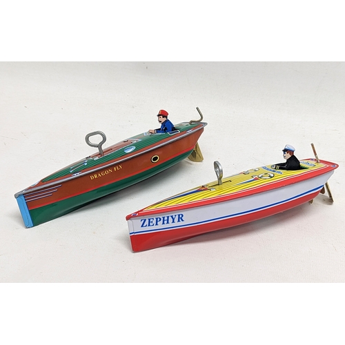 116 - 2 vintage wind-up tin speedboats by Schilling, Collector Series. 