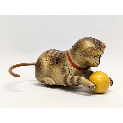 120 - A vintage wind-up tin toy, 'Rollover Cat,' made in US - Zone Germany by Kohler. 11.5cm