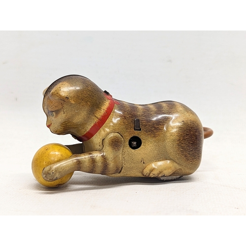 120 - A vintage wind-up tin toy, 'Rollover Cat,' made in US - Zone Germany by Kohler. 11.5cm