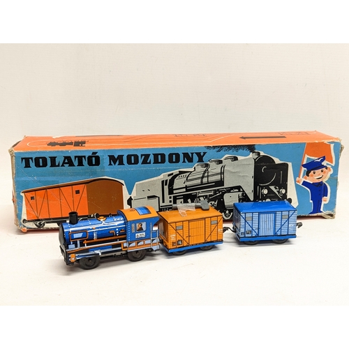 124 - A vintage tin toy train,  'Tolato Mozdony' by Elzeit Muvek, made in Hungary. In original box.