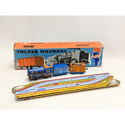 124 - A vintage tin toy train,  'Tolato Mozdony' by Elzeit Muvek, made in Hungary. In original box.