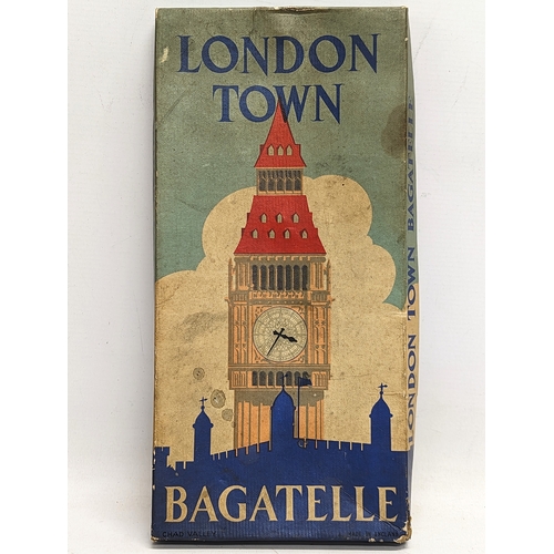 126 - A vintage game of London Town Bagatelle, manufactured by the Chad Valley. Box measures 17.5x36.5cm