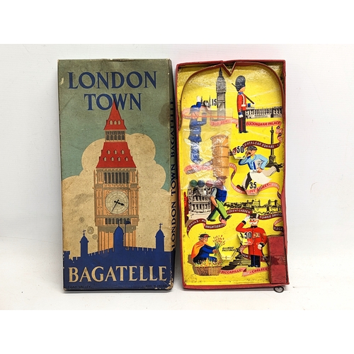 126 - A vintage game of London Town Bagatelle, manufactured by the Chad Valley. Box measures 17.5x36.5cm