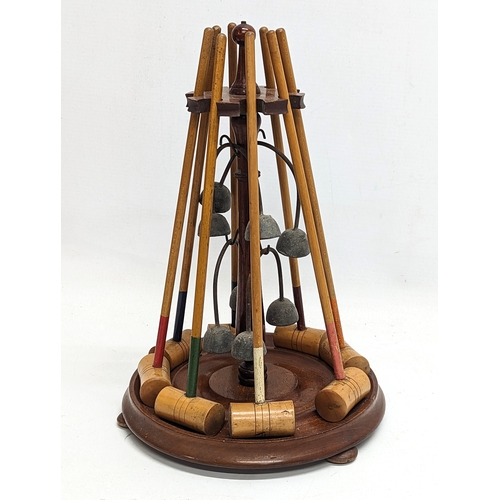 130A - A vintage tabletop croquet game. 29.5cm tall