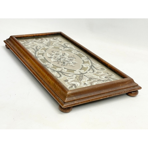 266 - A Victorian mahogany framed stand with beadwork and glass top. 50x26x6cm