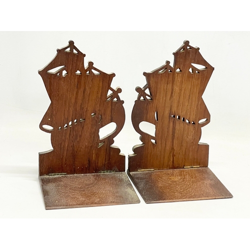 271 - A pair of teak bookends from HMS Iron Duke from the Battle of Jutland, 1916. Admiral Jellicoe’s Flag... 