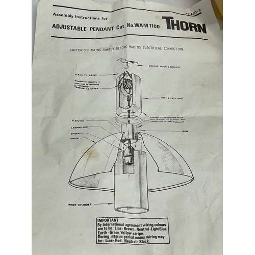 172 - A Mid Century Rise and Fall ceiling light by Thorn. Shade measures 38x16cm