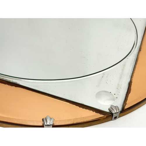 175 - A 1930’s Art Deco stain glass mirror. 56cm