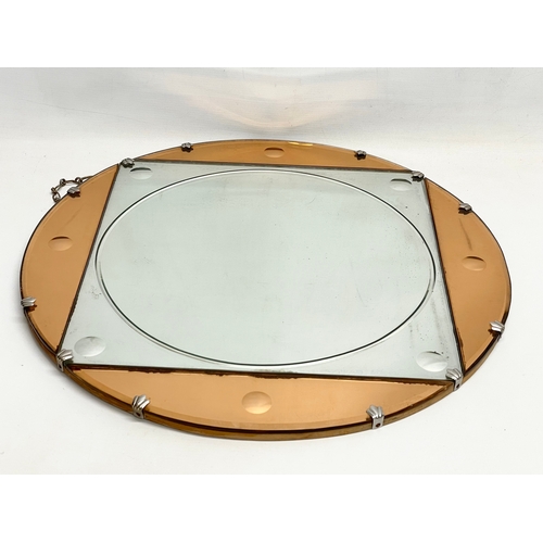 175 - A 1930’s Art Deco stain glass mirror. 56cm