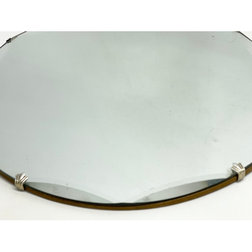 279 - 2 Art Deco bevelled mirrors. Largest 45cm